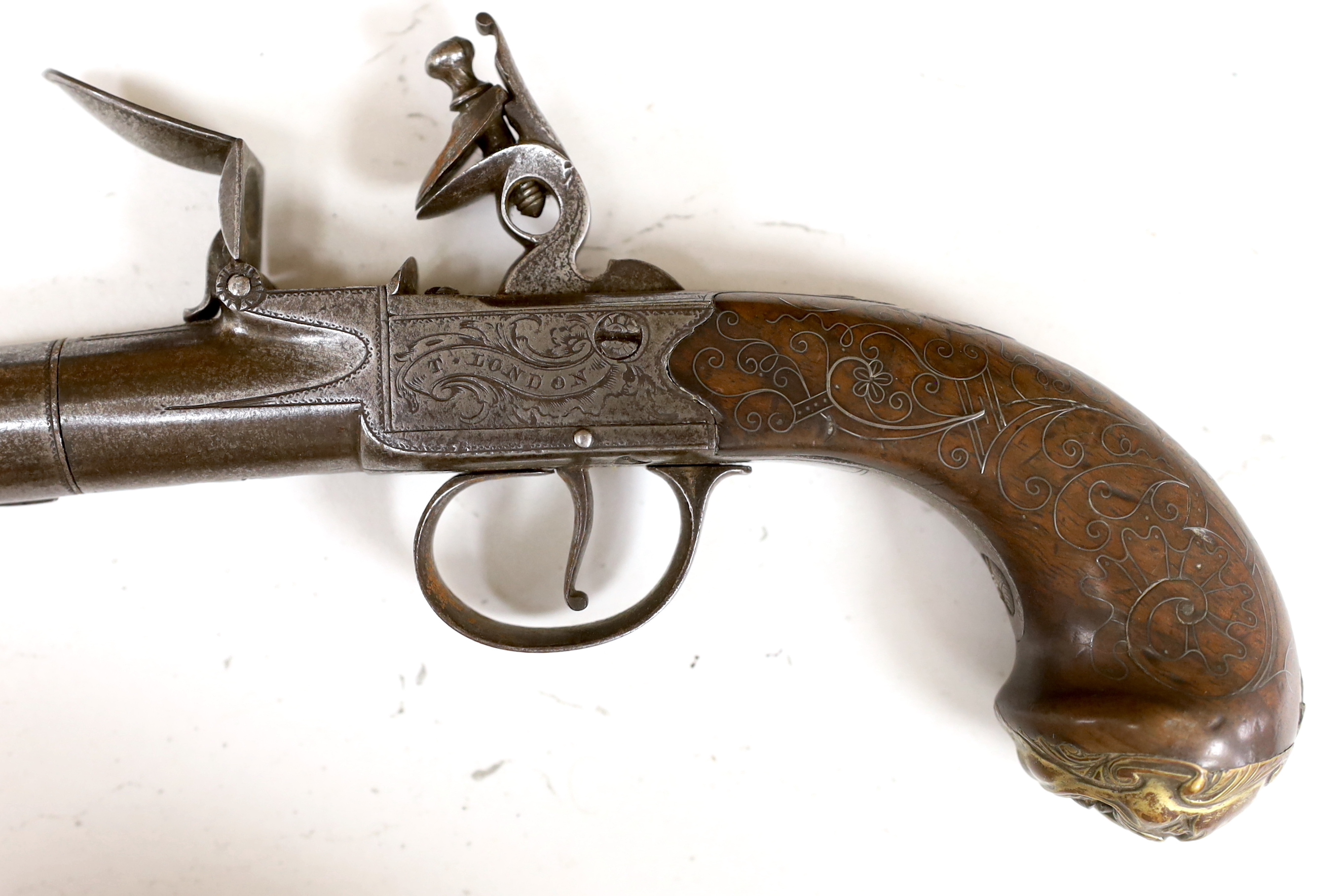 A Queen Anne style boxlock flintlock cannon barrelled holster pistol by T. London, maker's mark IH